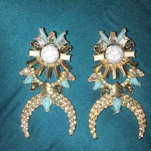 Chrystal and turquoise color earrings.